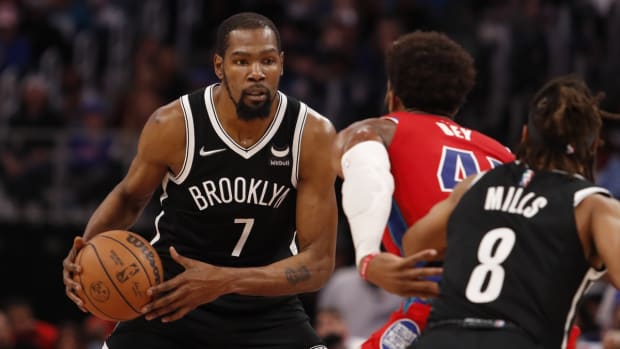 Nov 5, 2021; Detroit, Michigan, USA; Brooklyn Nets forward Kevin Durant (7) gets defended by Detroit Pistons forward Saddiq Bey (41) during the third quarter at Little Caesars Arena. Mandatory Credit: Raj Mehta-USA TODAY Sports